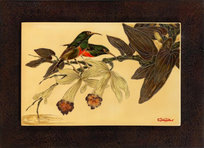 Couple de colibris dans les fleurs de vanille