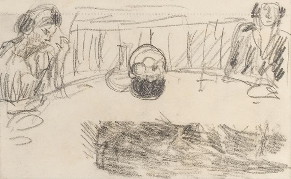 Assises à table, devant le panier de pommes